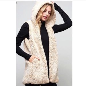 NWT tan Sherpa open vest. Teddy bear vest